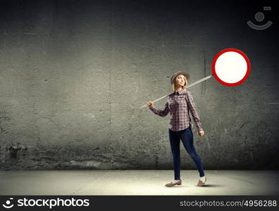 Stop pollution!. Young girl in casual holding stop sign