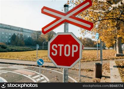 Stop red sign on autumn city background. Traffic signal. High quality photo. Stop red sign on autumn city background. Traffic signal.