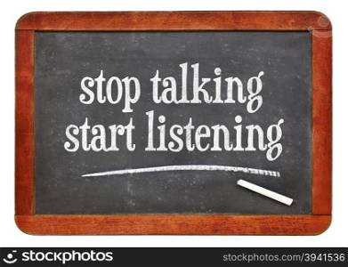 Stop talking, start listening - advice or reminder on a vintage slate blackboard