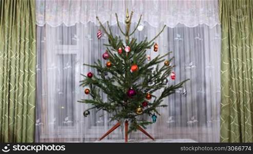 stopmotion of decorating Christmas tree and Santa Claus