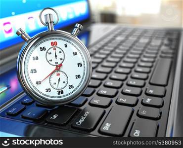Stopwatch on laptop keyboard. Deadline concept.