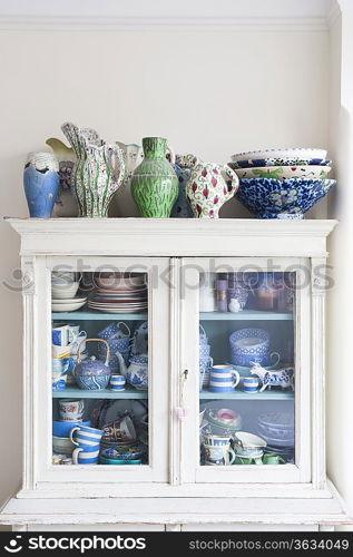 Storage cabinet with crockery