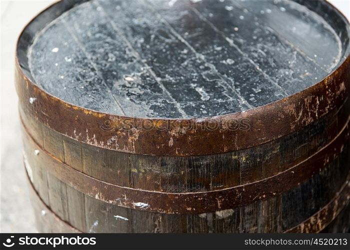 storage, container and object concept - close up of old wooden barrel outdoors
