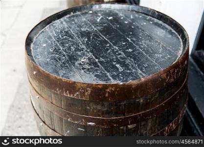 storage, container and object concept - close up of old wooden barrel outdoors