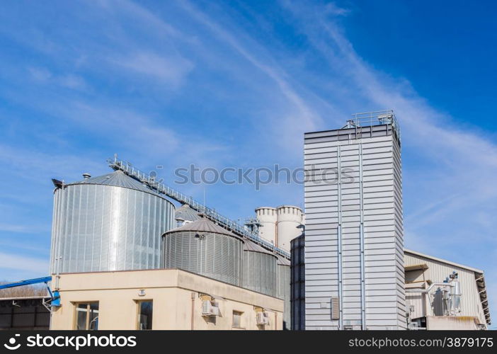 Storage facility cereals and production of biogas; silos and drying towers