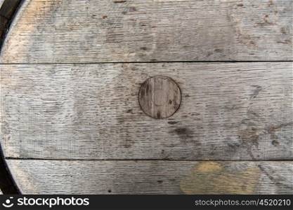 storage, winery, container and object concept - close up of old wooden barrel outdoors