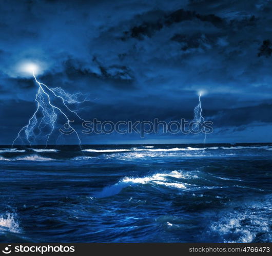 Storm at night. Image of dark night with lightning above stormy sea