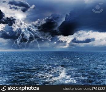 Storm at night. Image of dark night with lightning above stormy sea