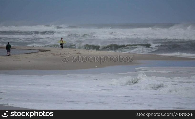 Storm blows in with people on the beach