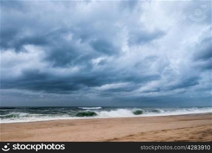 Storm cloud in the sea with the beach