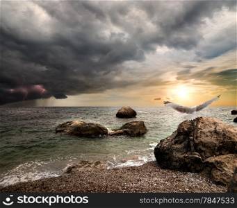 Storm clouds and lightning over the sea