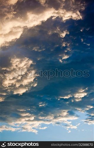 Storm Clouds at sunset, vertical orientation