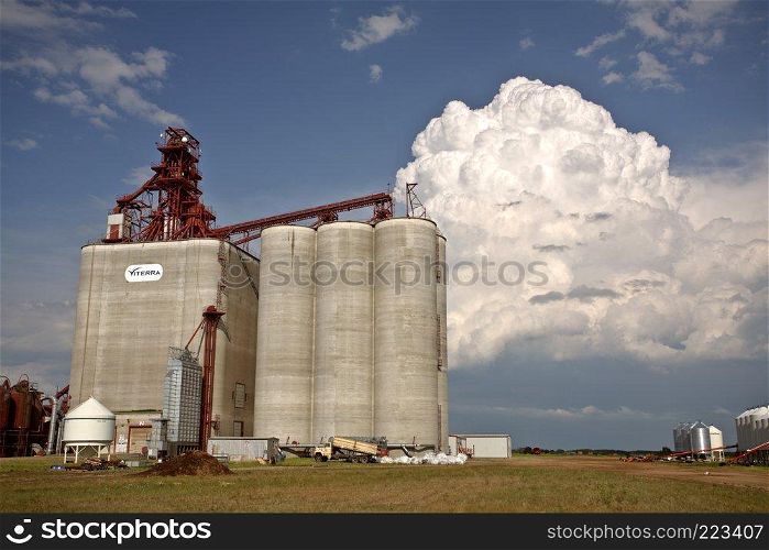 Storm clouds over Saskatchewan grain terminal