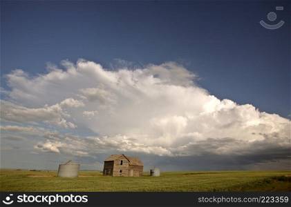 Storm clouds over Saskatchewan homestead