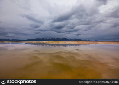 Storm sky over lake,Mongolia