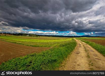 Stormy clouds above countryside road, miholec village, Prigorje region of Croatia