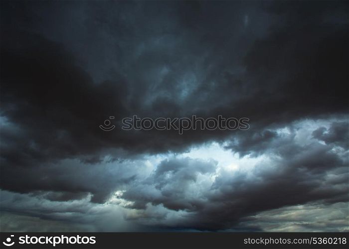 Stormy clouds gray low key sky with dramatic shadows and lights