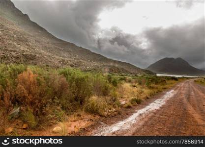 Stormy clouds settling down on the tall mountains of the picturesque landscapes of the Western Cape regions of South Africa