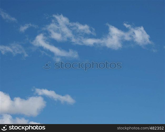 stormy dark blue sky with clouds useful as a background. dark blue sky with clouds background