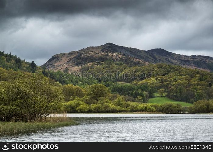 Stormy dramatic sky over Lake District landscape in England