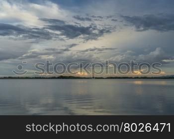 stormy evening sky over a lake at foothills of Rocky Mountains near Loveland, Colorado