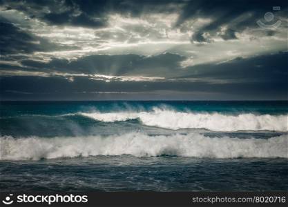 Stormy ocean landscape with rainy clouds