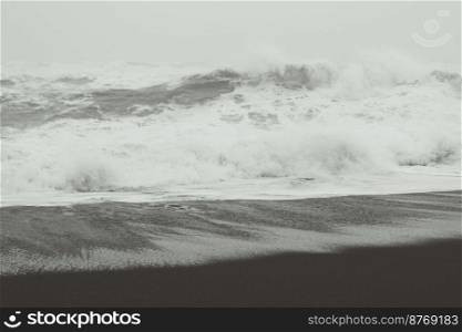 Stormy weather on sea monochrome landscape photo. Beautiful nature scenery photography with foamy waves on background. Idyllic scene. High quality picture for wallpaper, travel blog, magazine, article. Stormy weather on sea monochrome landscape photo