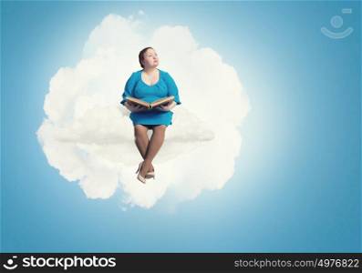 Stout woman. Plus size woman with book in hands sitting on cloud
