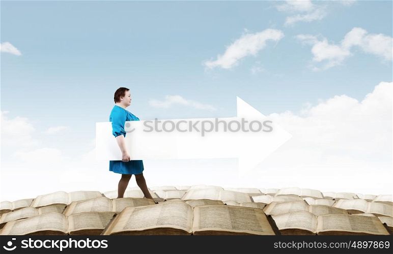 Stout woman with banner. Stout woman of middle age with blank white arrow banner