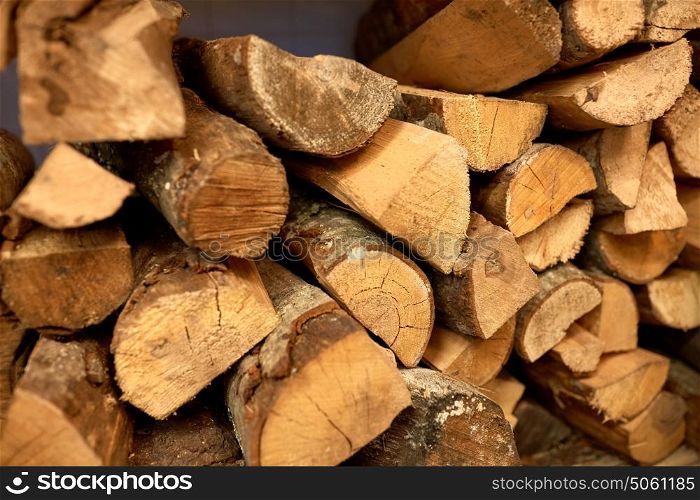 stove heating and wood fuel concept - firewood. close up of firewood