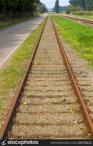 Straight railway line going towards the horizon