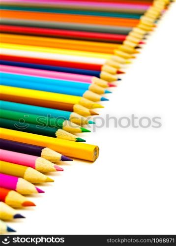 Straight Row Of The Multicolored Pencils With One Another Against The White Background. Pencils