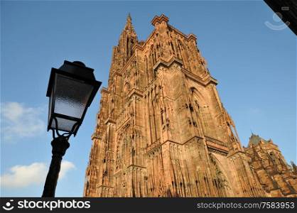 Strasbourg cathedral with lamp post and sky