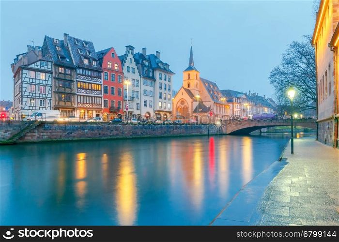 Strasbourg. Quay St. Nicholas.. Scenic view of the promenade of St. Nicholas in the quarter Petite France at sunset. Strasbourg. Alsace.