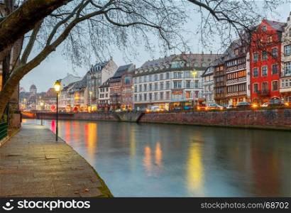 Strasbourg. Quay St. Nicholas.. Scenic view of the promenade of St. Nicholas in the quarter Petite France at sunset. Strasbourg. Alsace.