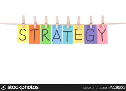 Strategy, paper words card hang by wooden peg