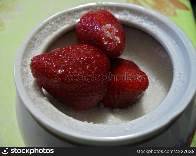 Strawberries and sugarpot