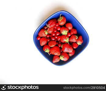 Strawberries in aBlue Bowl, on a light background