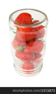 Strawberries in upset jar isolated on white background