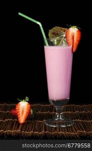 Strawberries milk shake and fresh fruit strawberry. Cocktail with milk.