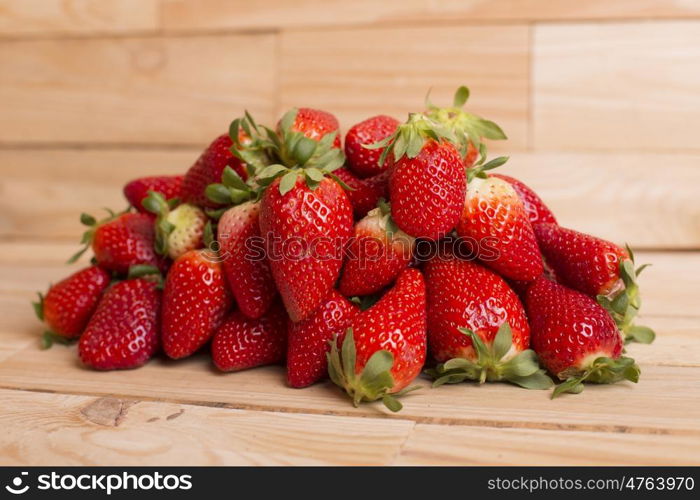 strawberries on a wooden table, studio picture