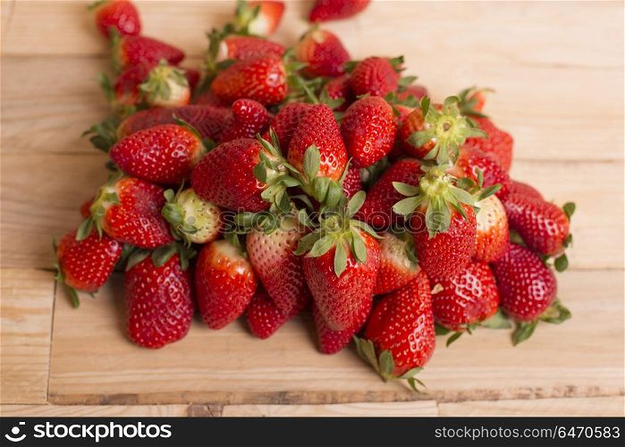 strawberries on a wooden table, studio picture. strawberries