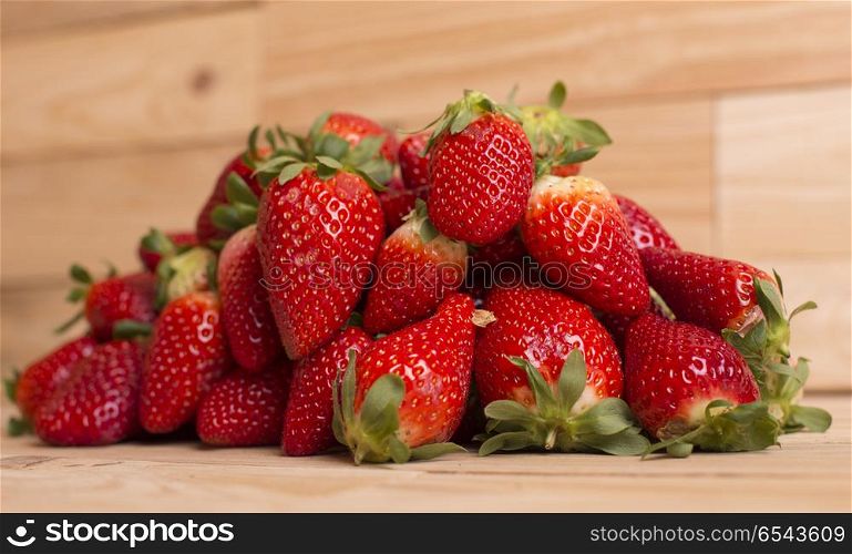 strawberries on a wooden table, studio picture. strawberries