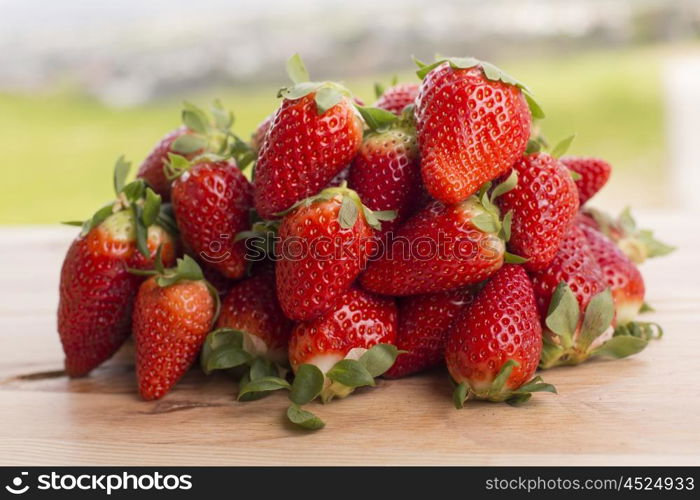 strawberries on garden's table, outdoor picture