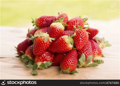strawberries on garden's table, outdoor picture