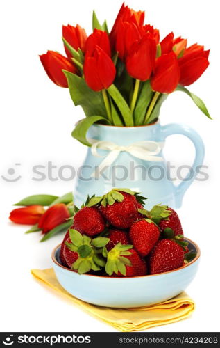 strawberry and bouquet flowers on a white background