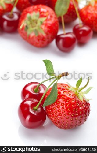 Strawberry and cherry on white