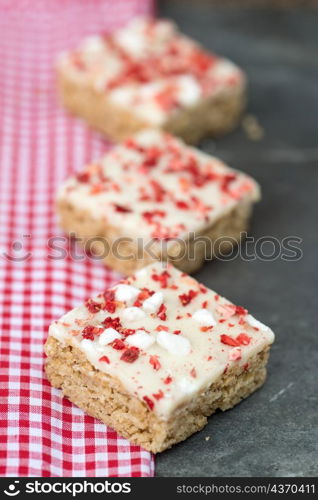 Strawberry and meringue topped flapjack