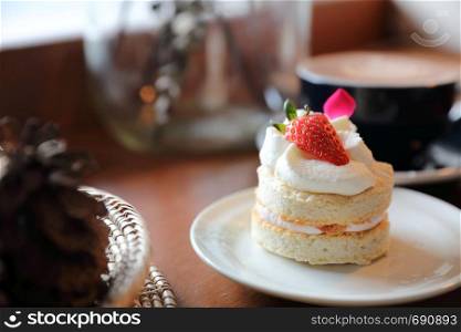 Strawberry cake dessert on wood table