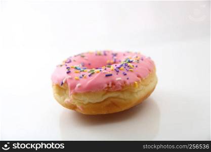 Strawberry chocolate donut isolated in white background